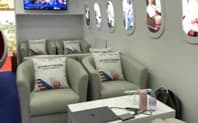 Visitor seating inside the American Airlines exhibition stand